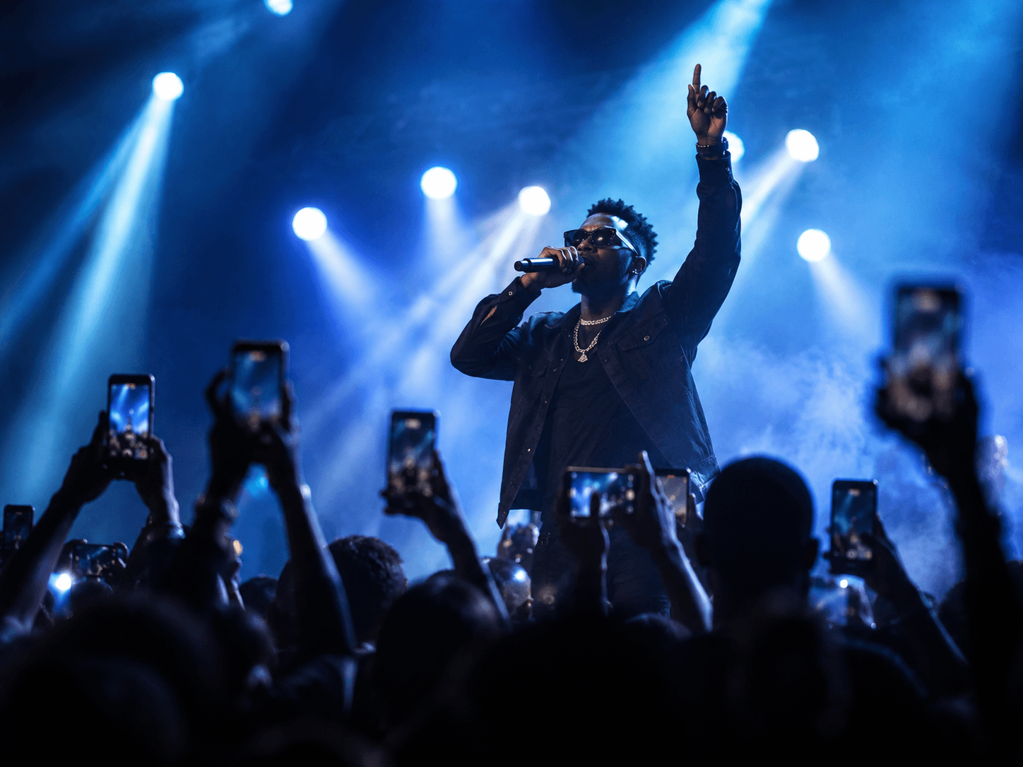 A live performance with a crowd and stage lighting